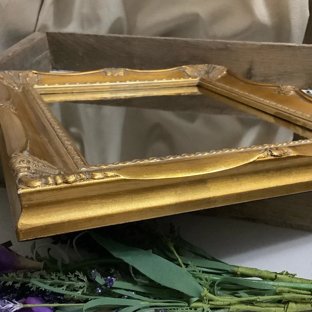 Ornate Gold Wall Mirror with Decorative Frame